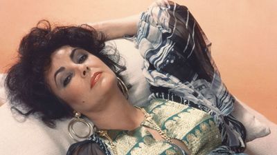 I thought I was over dark front doors, but the unusual paint strategy on Elizabeth Taylor's '70s home changed my mind – it's so innovative but classic