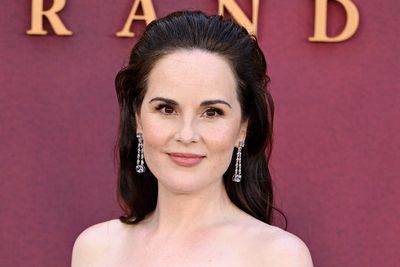 Downton Abbey star Michelle Dockery reveals she’s pregnant with first child at new film’s premiere