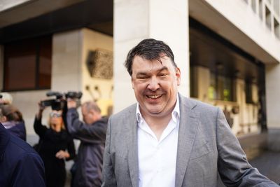Graham Linehan arrives at court to face trial accused of harassing trans woman