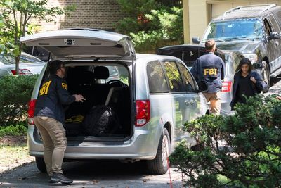FBI seized phones, computer equipment, folders during search of Bolton's home, records show