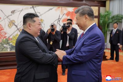 Kim, Xi hail bond as North Korea says it will protect China’s interests