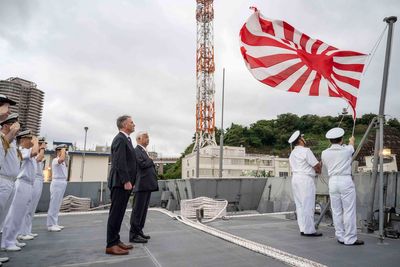 Australia's defense minister visits a frigate in Japan as the countries boost defense ties