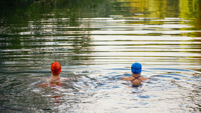 Fed-up swimmers take on the Thames in fight against water pollution and tell lawmakers it's a "national scandal"