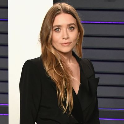 Ashley Olsen Styles The Row's Trench Coat as a Minimalist Fall Dress