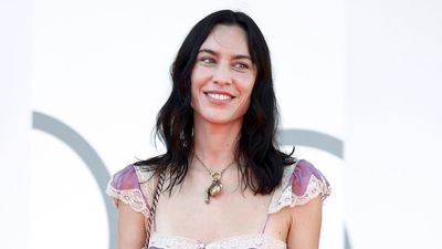 Alexa Chung pairs a grapefruit pink Chloé gown with this season's boldest shoe trend