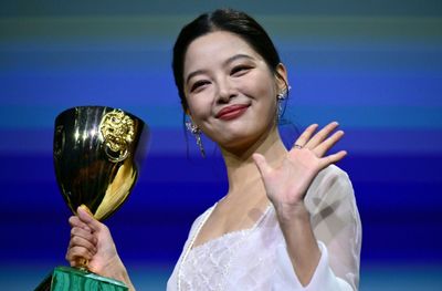 China's Xin Zhilei Wins Best Actress Award At Venice Film Festival