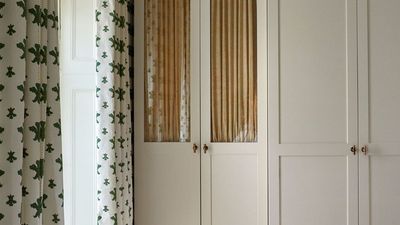 Hate window film but looking to hide clutter in your glass-fronted cabinets? This whimsical no-sew cabinet curtain DIY could be the answer you've been searching for