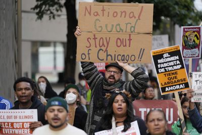 Trump threatens ‘war’ on Chicago as thousands protest federal crackdown