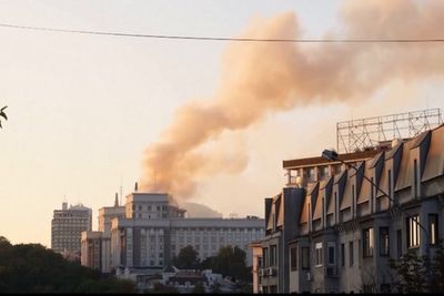 Kyiv government building hit as smoke rises following mass Russian attack