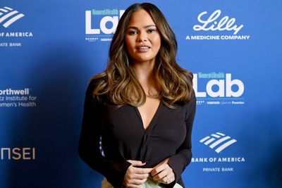 Chrissy Teigen makes late-night snack confession on cooking show