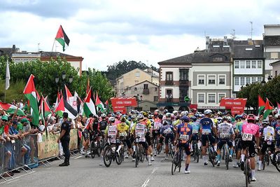Pro-Palestine activists emit slogans and songs over official race radio at Vuelta a España after hacking communication systems