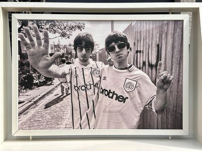 I'm not an Oasis fan, but these beautiful and intimate photographs finally helped me appreciate the group's appeal