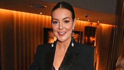 Sheridan Smith’s slick bun and face-framing earrings are a simple combination that delivers effortless glamour