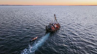 Trash to transport: crossing Bass Strait in a boat made of Tasmanian fish farm debris