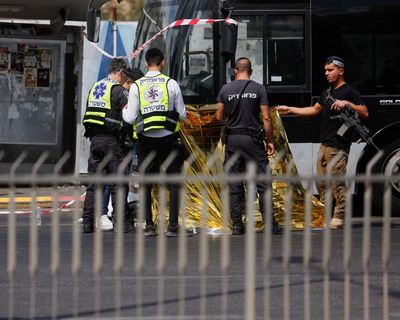 Palestinian gunmen kill six people at Jerusalem bus stop