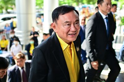 Thai Ex-PM Thaksin Lands In Bangkok Ahead Of Crucial Court Date