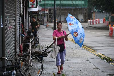 Typhoon Tapah makes landfall in China, prompting mass evacuations, closures