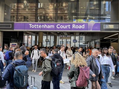 London defies the Tube strike: Commuters battle to work on trains, buses and bikes... as RMT threatens more walkouts