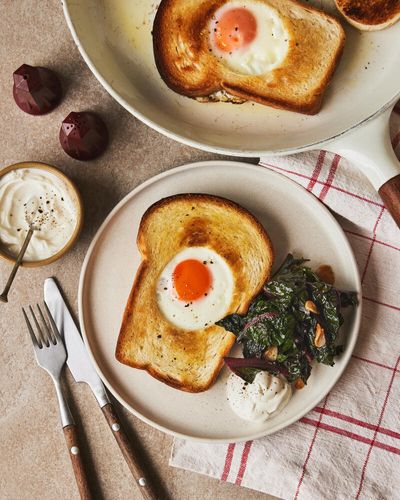 Rukmini Iyer’s quick and easy eggs in a basket with smoky chard – recipe