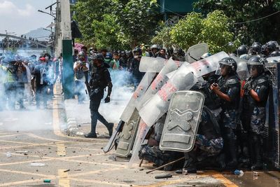 Police and protesters clash in Nepal after social media ban