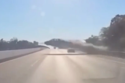 Car goes airborne over six lanes of traffic on Long Island highway