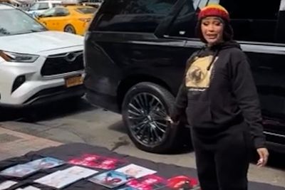 Cardi B pokes fun at trial as she poses as bootleg album seller on New York street