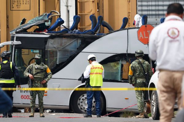 Freight train slams into a bus outside Mexico City and kills at least 8 people