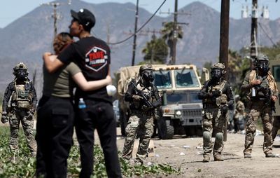 Supreme court lifts restrictions on LA immigration raids in win for Trump