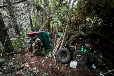 Slain New Zealand father kept bushland hideout with weapons, police say