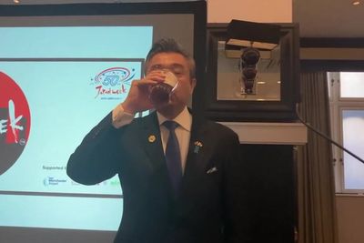 Japanese ambassador cheered on by pub crowd as he downs pint of bitter in Manchester