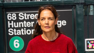 Katie Holmes shows us the chicest way to style brown trousers - and her whole outfit is available on the high street