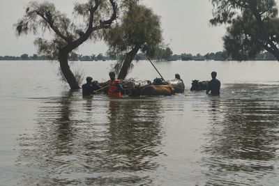 Rescuers in Pakistan scramble to save residents as swollen rivers reach dangerous levels