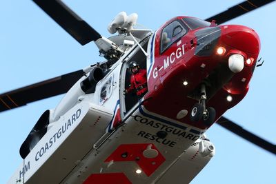 Two rescued from sinking fishing vessel by helicopter