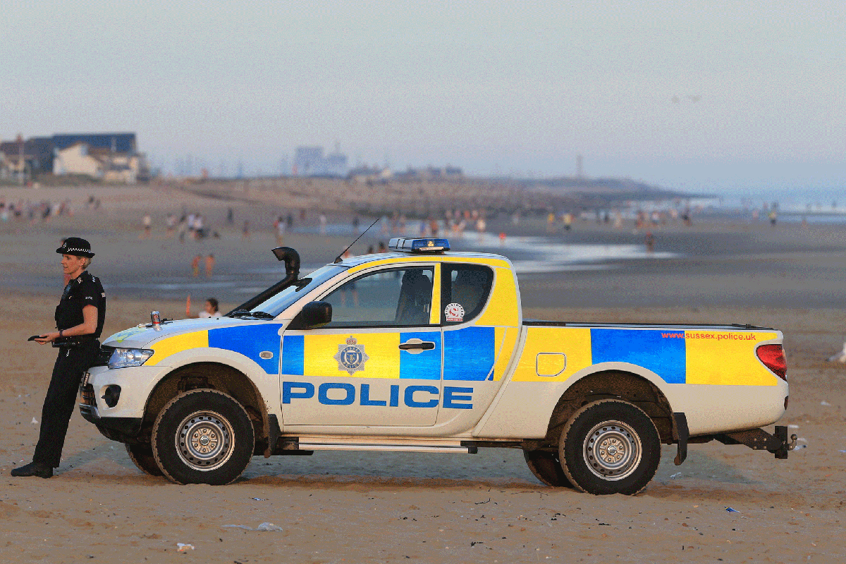 Man charged with sexually assaulting woman as she sunbathed on beach