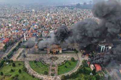 Photos show violent protests in Nepal, with government buildings set on fire