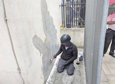Banksy mural of UK judge hitting protester scrubbed from London court wall