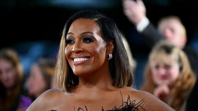 Alison Hammond stuns in a feathered evening gown at the NTAs - her playful look was certainly a head turner