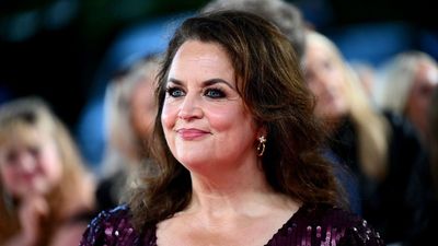 Ruth Jones signals the start of sequin season in a glamorous plum-coloured dress at the NTAs