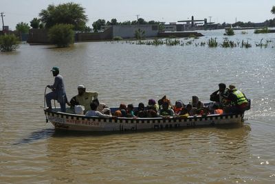 Rescue boat evacuating flood victims capsizes in eastern Pakistan, killing 9