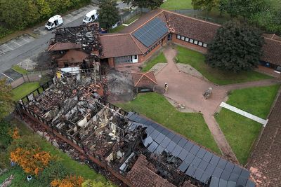 Man arrested on suspicion of criminal damage and arson after fire at MP’s office