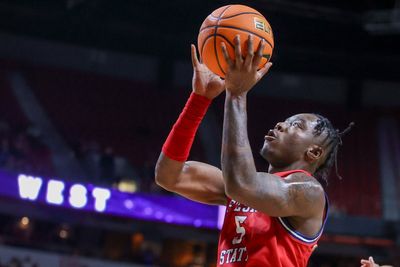 NCAA investigates 13 former basketball players for sports betting violations