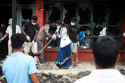 Nepal’s Gen Z protesters lead street clean-up after days of violent unrest