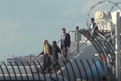 Charlie Kirk’s wife Erika clutches Usha Vance’s hand as casket arrives in Phoenix