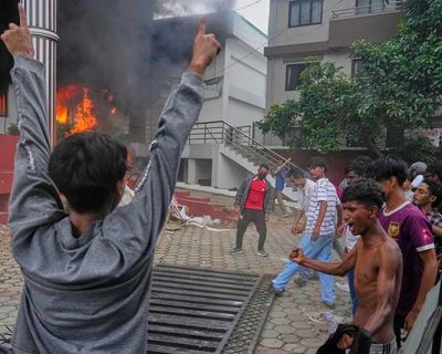Nepal appoints its first female PM after historic week of deadly protests