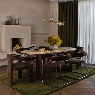 ‘They nod to the past but feel firmly of the present’ – John Lewis’ retro lounge and dining chairs champion the biggest furniture trend of the year