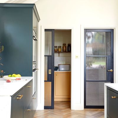 Is a small kitchen with a utility better than an open plan kitchen? This is the ultimate layout for organisation
