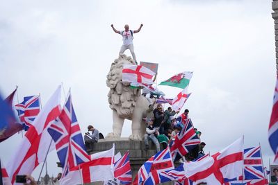 Thousands march in London in support of far-right activist Tommy Robinson