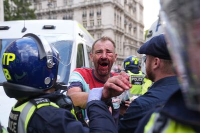 Police ‘assaulted’ and face ‘aggression’ from Tommy Robinson protesters