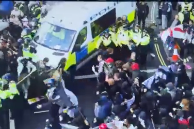 Police officers ‘assaulted’ as Tommy Robinson march draws thousands to London