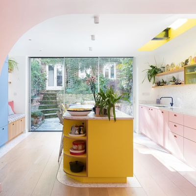 This colourful kitchen diner is a masterclass in how contrasting shades can combine to create a stunning scheme
